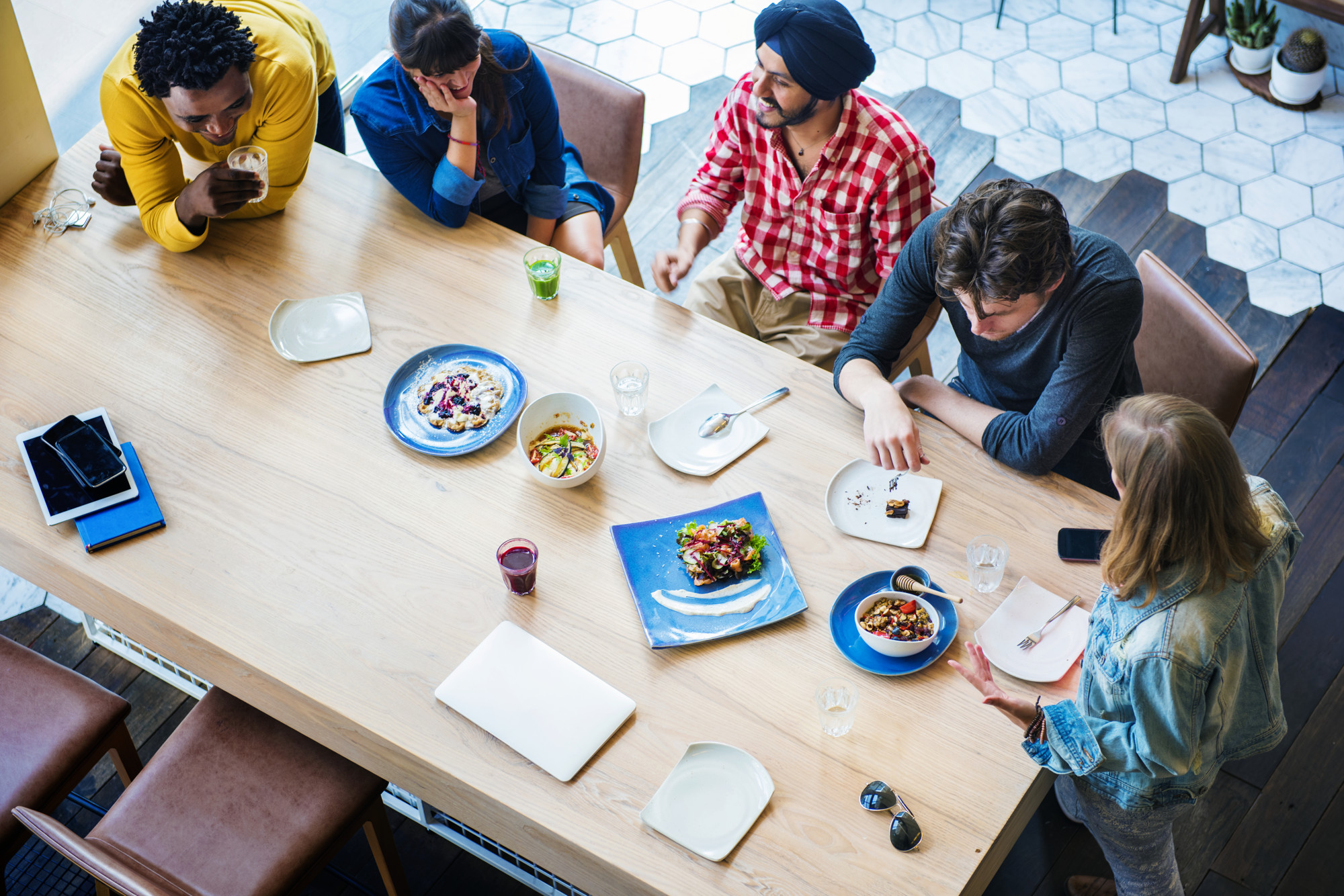 Team discussing menu around table