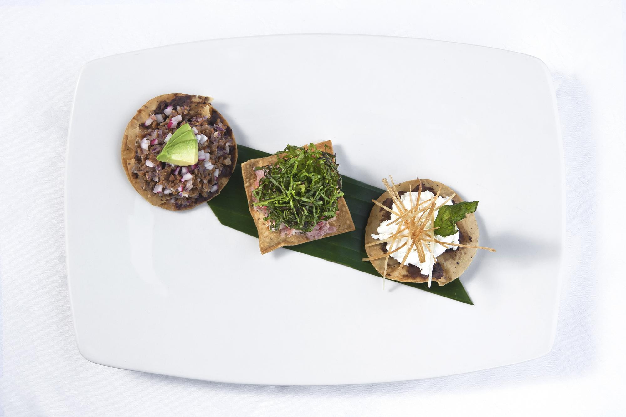 Close up plated starter with herbs
