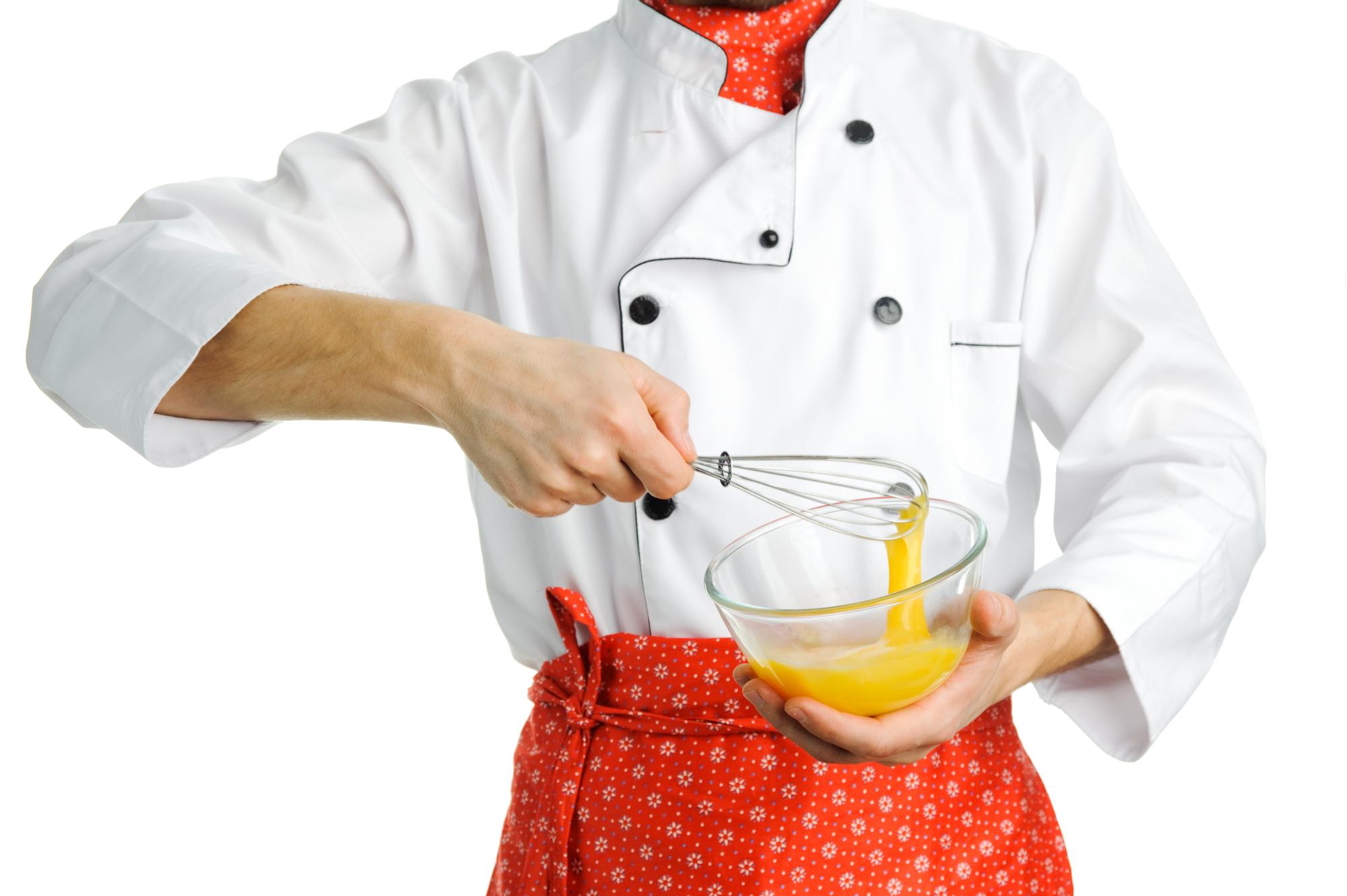 Chef hands finishing dessert