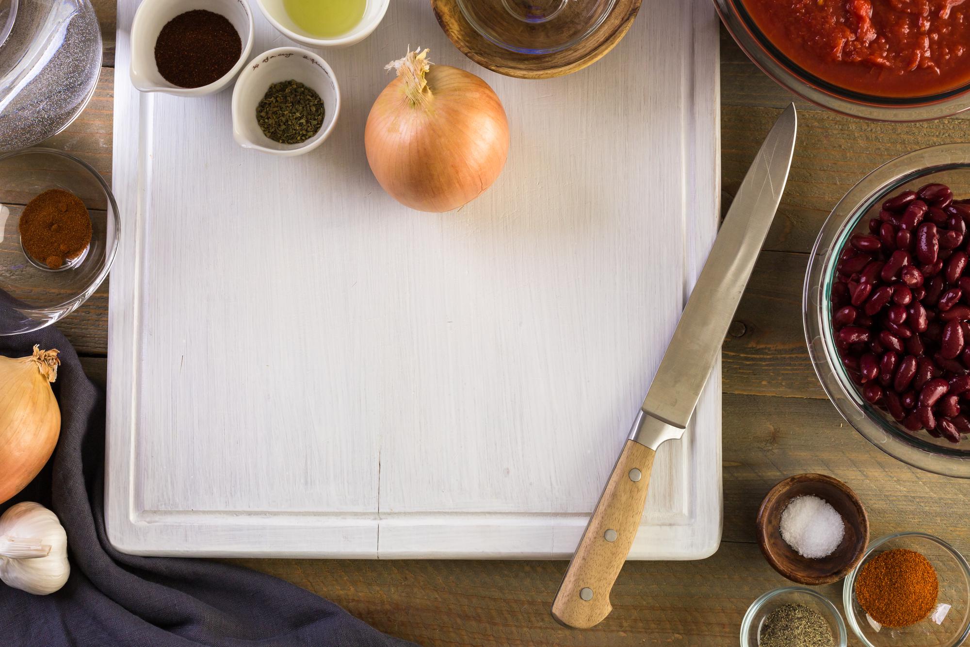 Culinary workspace with tools and notes